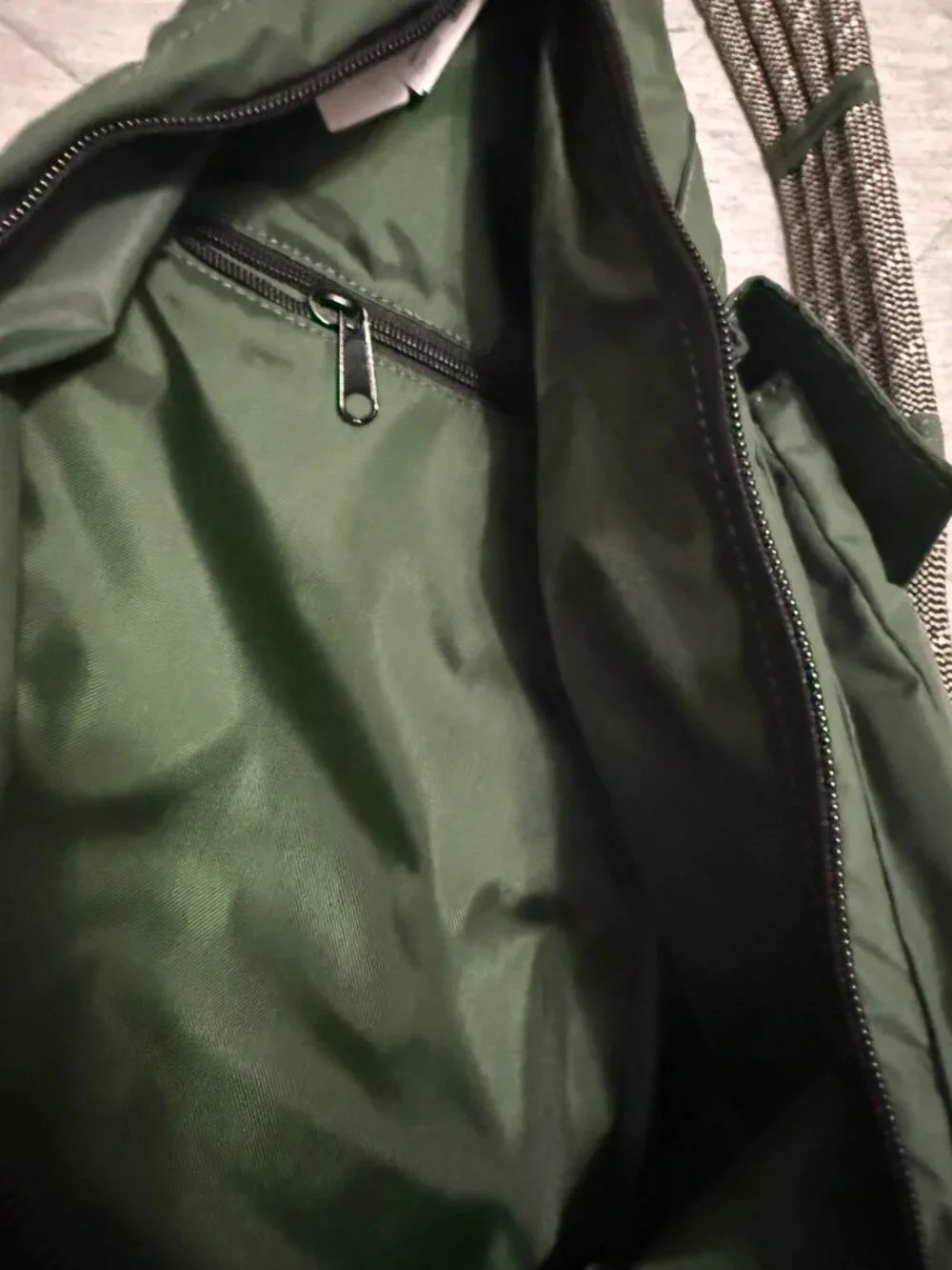 KAVU Rope Sling crossbody bag in a solid green colorway